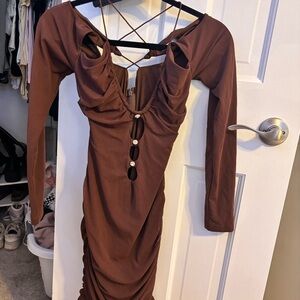 Going out dress. Brown, with gems and a criss crossed back.